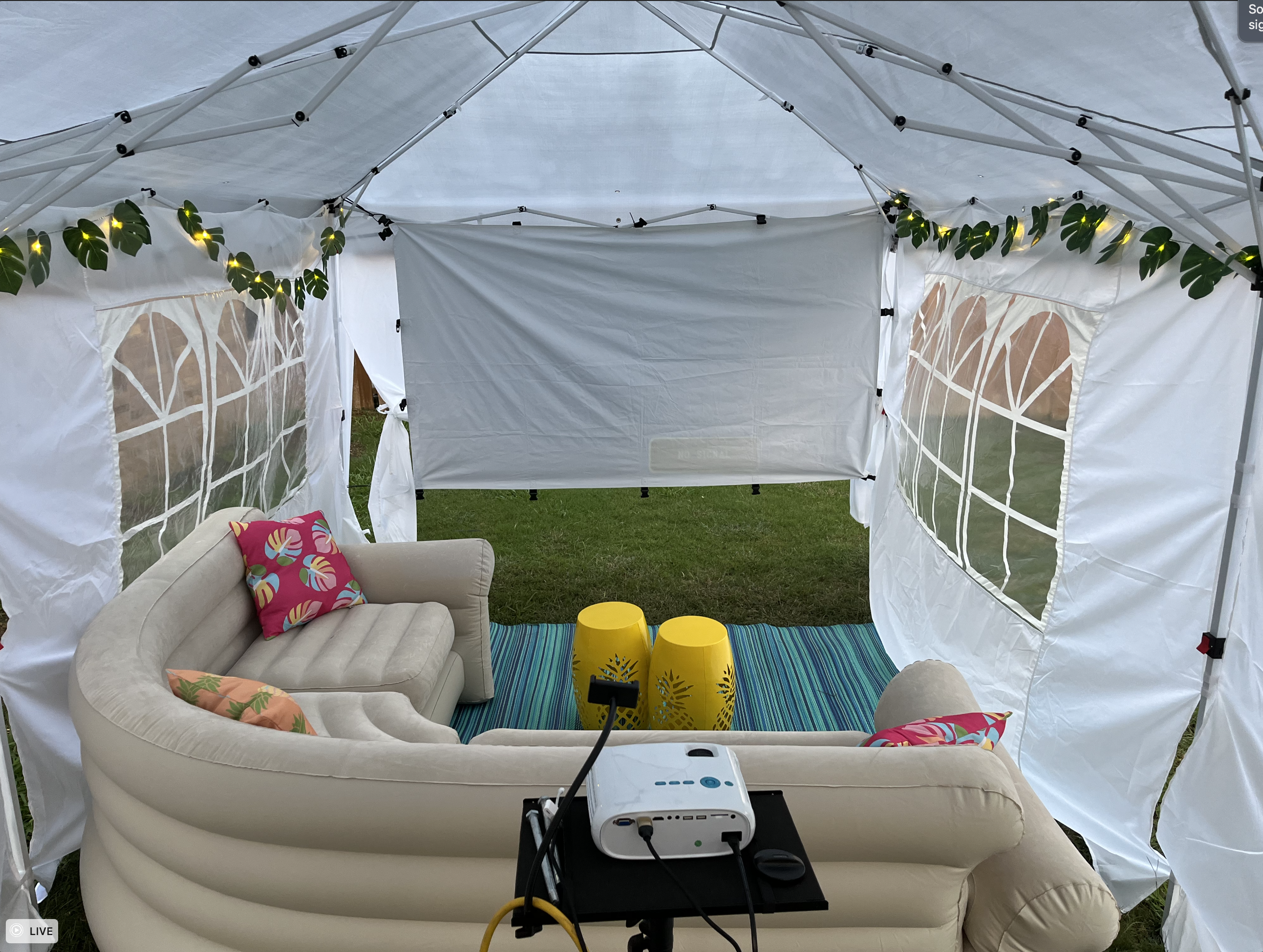 Picture of backyard setup for a movie night.